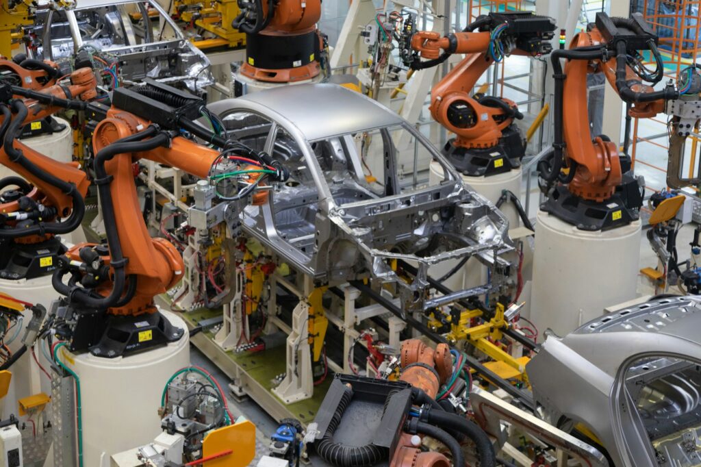 body of car on conveyor top view. Modern Assembly of cars at the plant. The automated build process