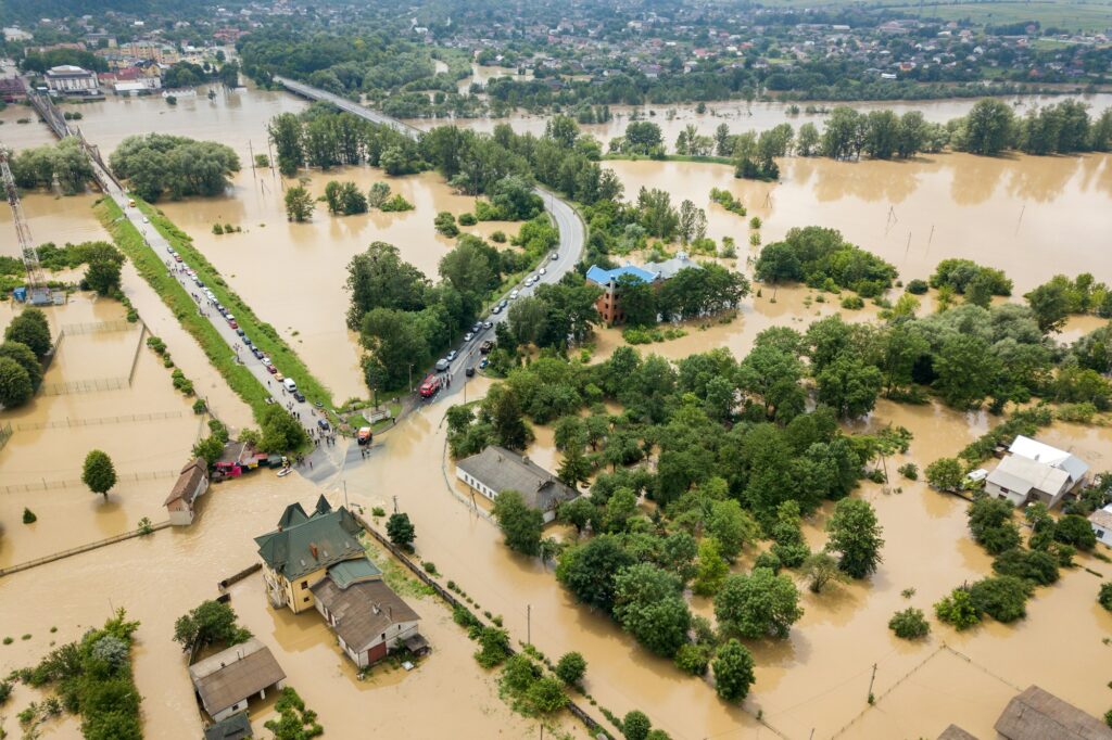 Aerial view of flooded houses with dirty water of Dnister river in Halych town, western Ukraine